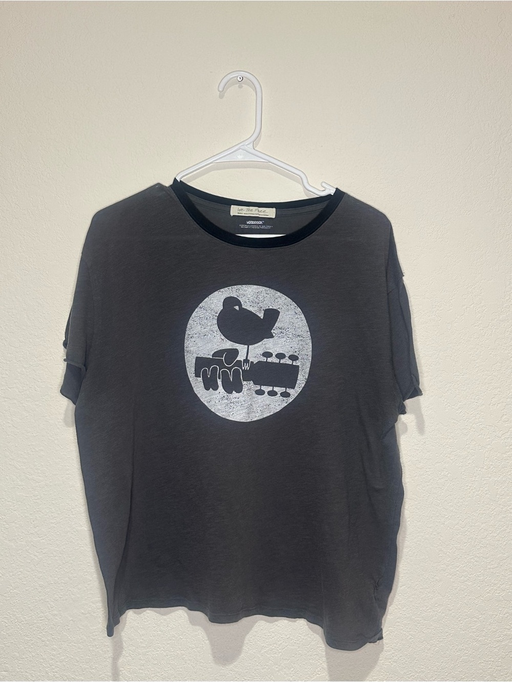 We the Free Woodstock Vintage-Style Black Graphic Tee with Bird & Guitar Motif